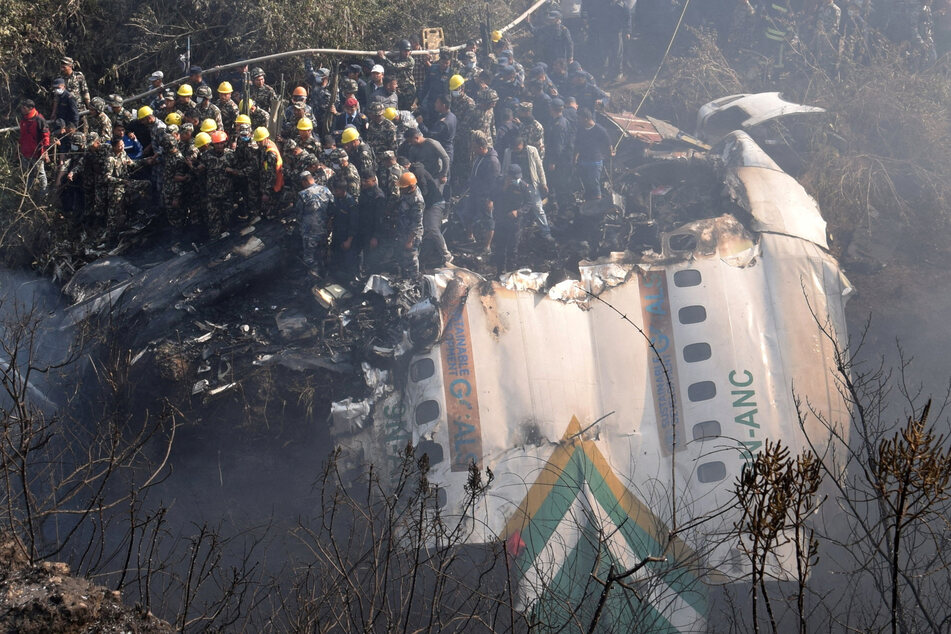 Nepalese authorities continue to search for the three remaining victims of Sunday's plane crash.