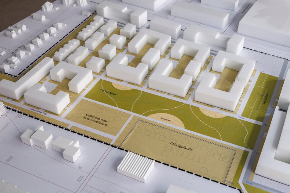 Das Modell zeigt Wohnhäuser und Park.