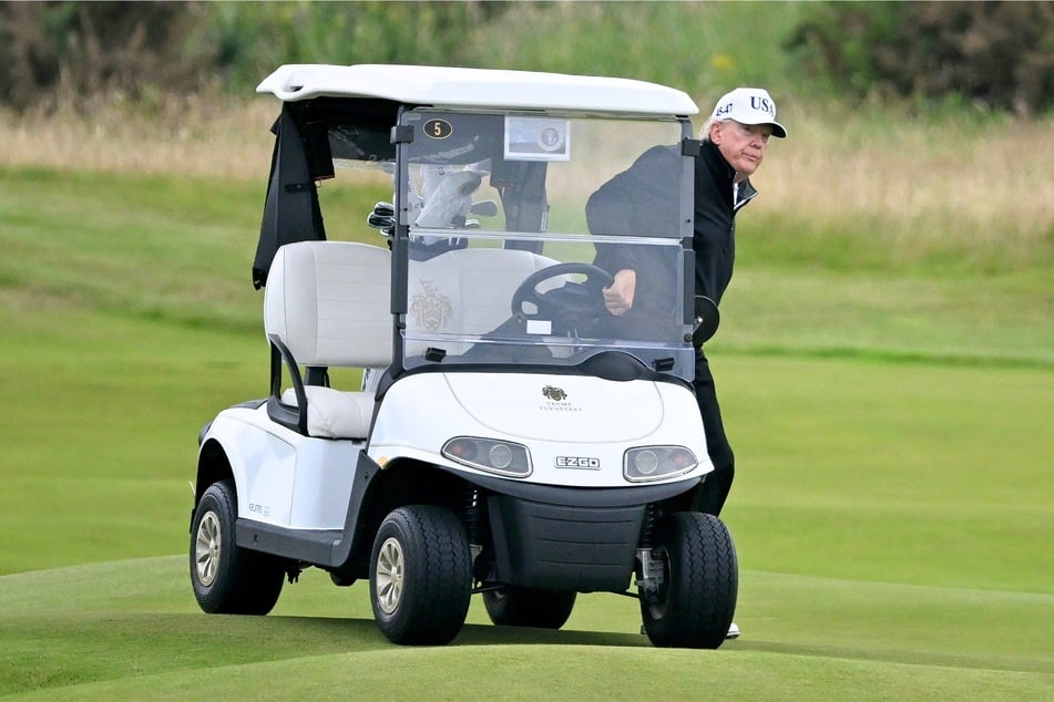 President Donald Trump playing golf at the Trump Turnberry Golf Courses in Scotland on Sunday.