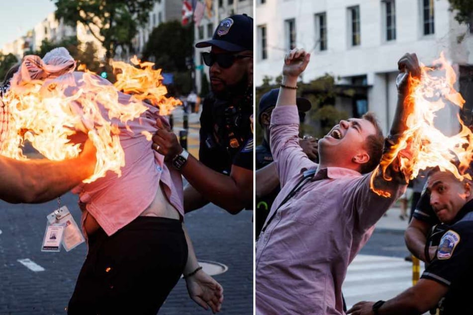 Police help a man who tried to set himself on fire as people demonstrate to mark one year of the war between Hamas and Israel near the White House in Washington, DC, on Saturday.