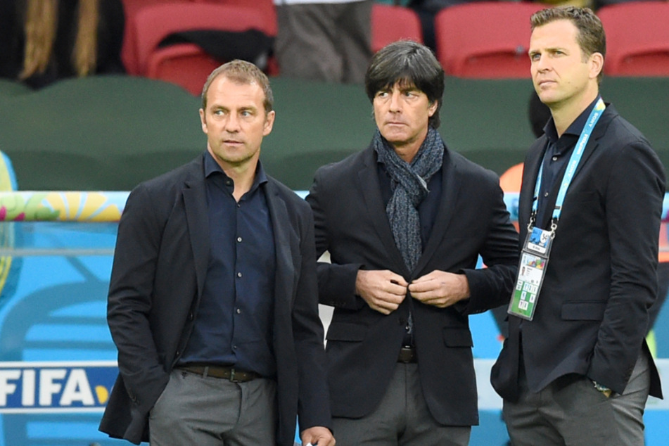 Hansi Flick (56, l.-r.), Joachim Löw (61) und Oliver Bierhoff (52) bei der WM 2014 in Brasilien.