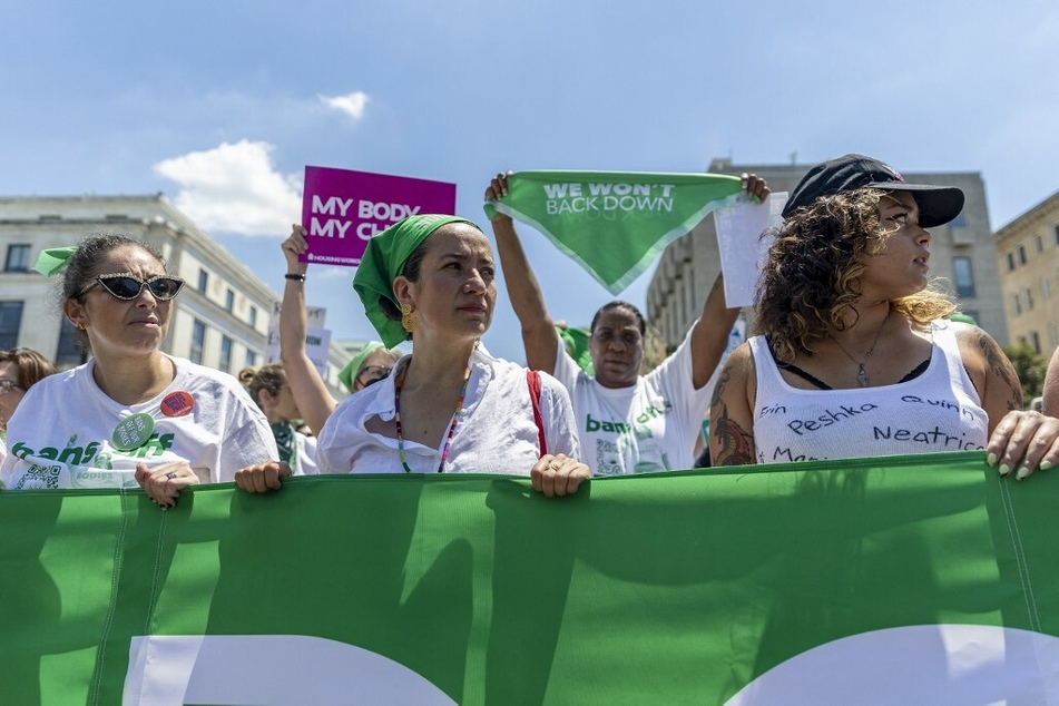 Abortion rights activists protest outside the US Supreme Court in Washington DC.