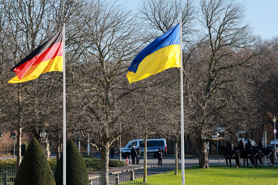 A German flag and a Ukrainian flag fly at Bellevue Palace ahead of German President Frank-Walter Steinmeier's meeting with Ukraine's President Volodymyr Zelensky, in Berlin, Germany, on December 15, 2025.