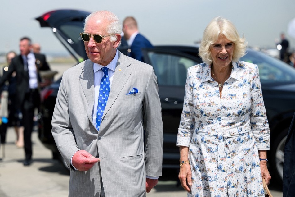 Britain's King Charles III and Queen Camilla arrive for their official departure from Sydney Airport on October 23, 2024.