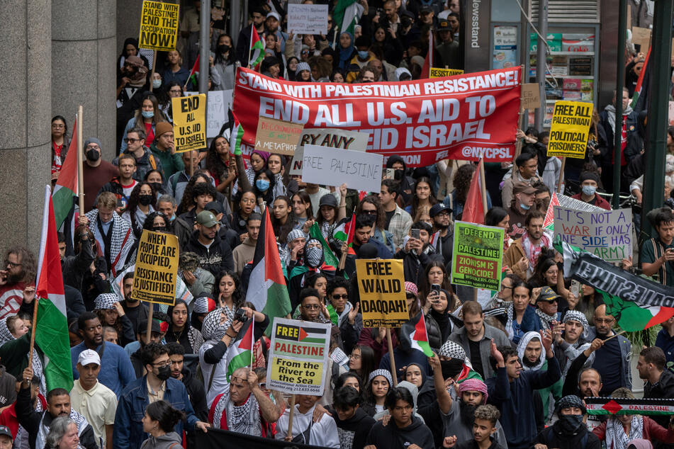 Palestinian rights supporters march during the second day of the ongoing conflict between Israel and Gaza, in New York City on October 8, 2023.