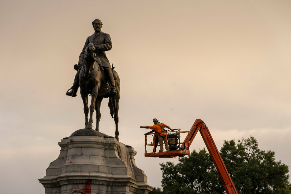 Crews prepare to dismantle the statue of Confederate general Robert E. Lee in Richmond, Virginia.