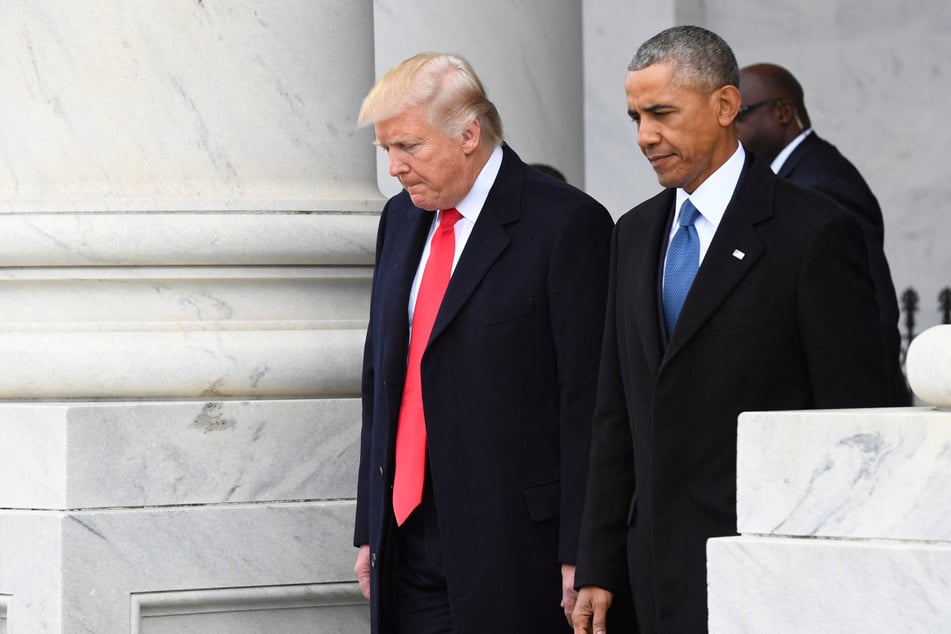 President Donald Trump (l.) posted a bizarre video showing former President Barack Obama getting arrested and jailed.