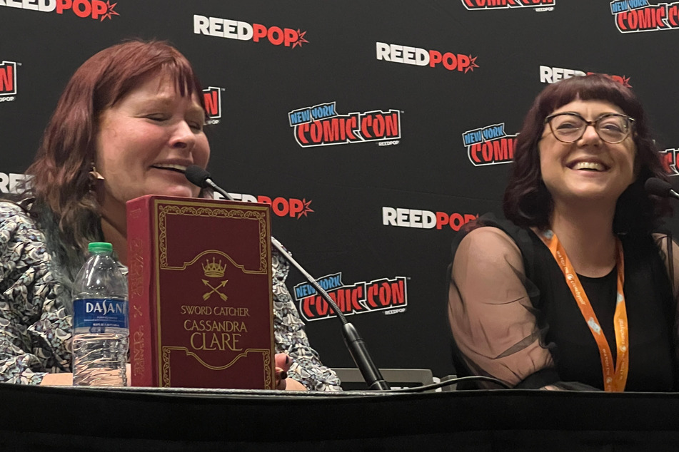 Cassandra Clare (l.) and VE Schwab answered questions from fans during Saturday's Building Bestselling Worlds panel.