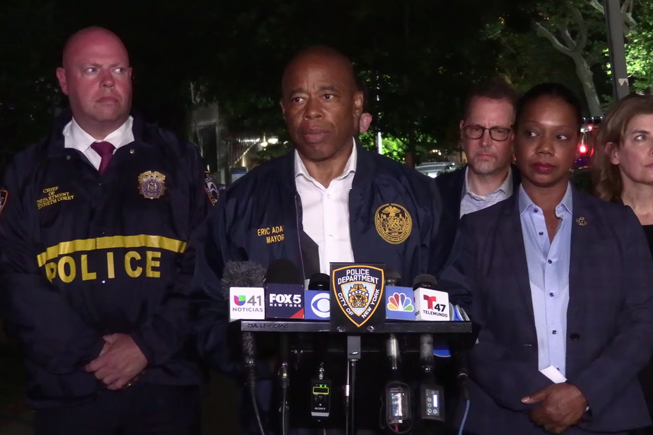 Mayor Eric Adams (c.) and law enforcement issued an update regarding the shooting that took place in the Upper East Side of Manhattan on Wednesday night.