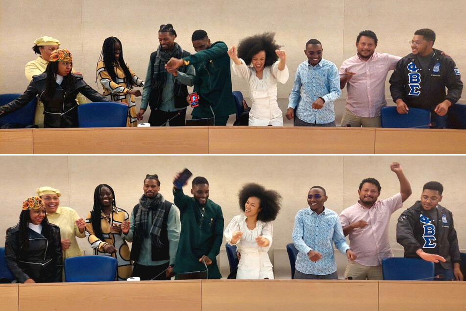 Youth representatives celebrate following the conclusion of the third session of the United Nations Permanent Forum on People of African Descent.