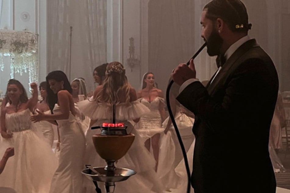 Drake shared a behind-the-scenes snap from the music video for Falling Back, where he's seen smoking hookah.