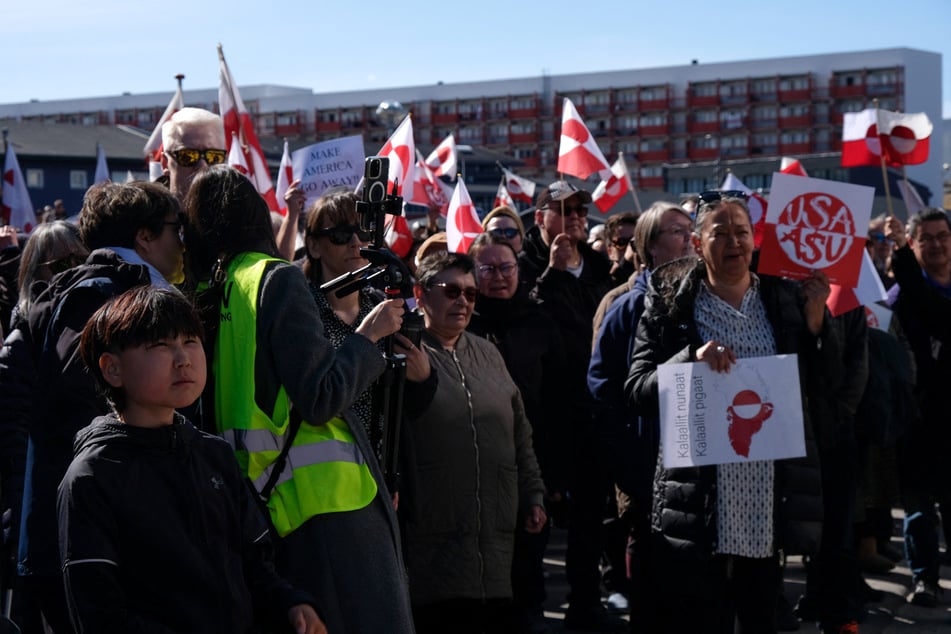 People gather to protest on the day of the opening of a new US consulate in Nuuk, Greenland, on May 21, 2026.