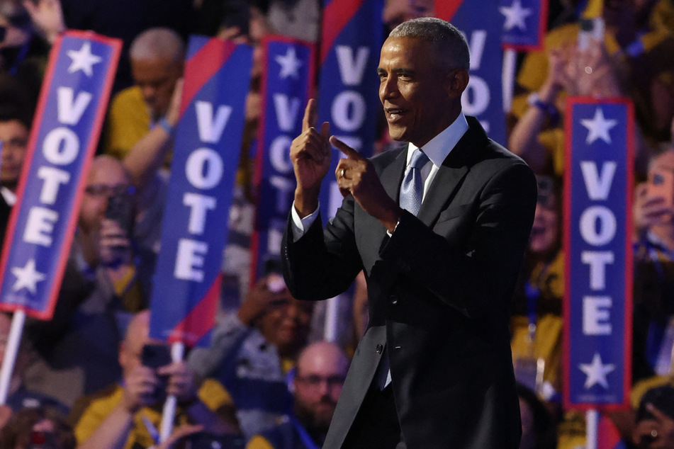 Former President Barack Obama takes the stage during Day 2 of the Democratic National Convention in Chicago, Illinois.