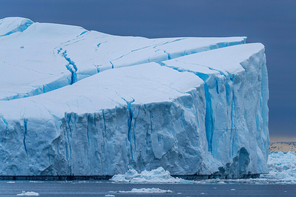 Crumbling sea ice will require people to adapt to changing sea levels.
