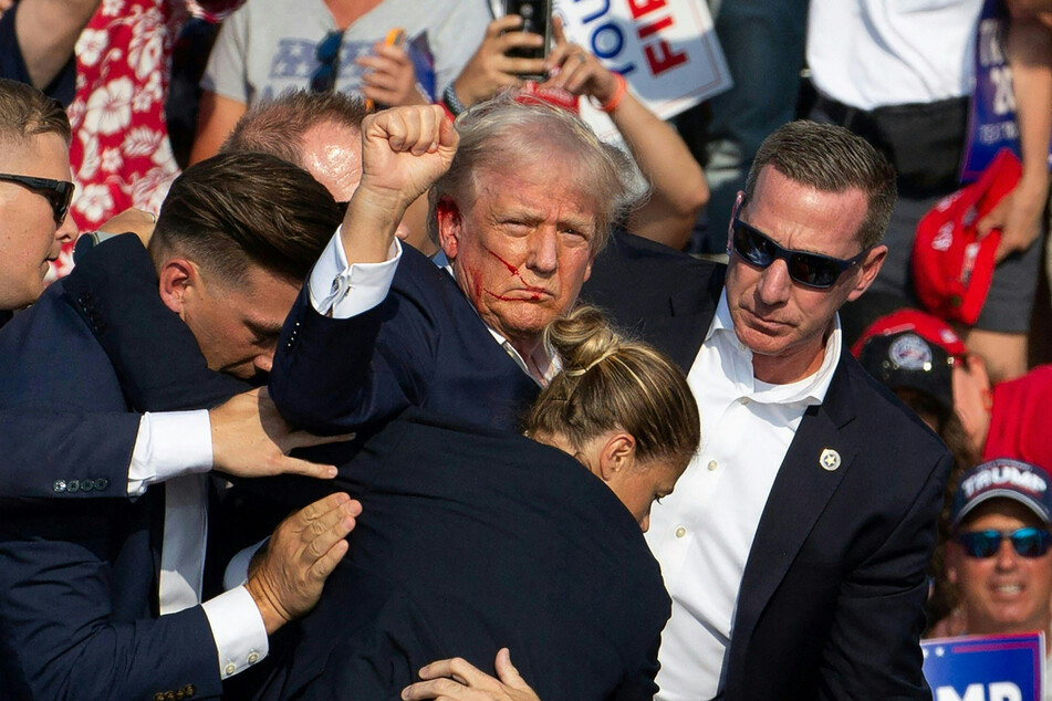 Iconic images of a bloodied Trump waving his fist after the shooting are already galvanizing Republican hopes that voters will further rally behind him for a landslide victory in November.