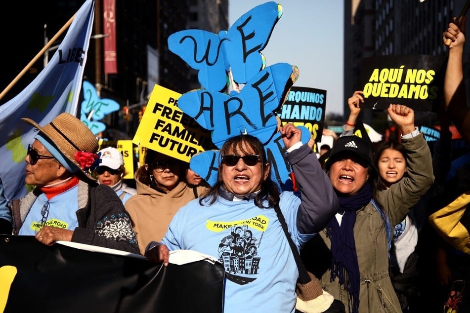 Activists take part in a protest against president-elect Donald Trump's anti-immigrant, anti-worker policies in New York City on November 9, 2024.