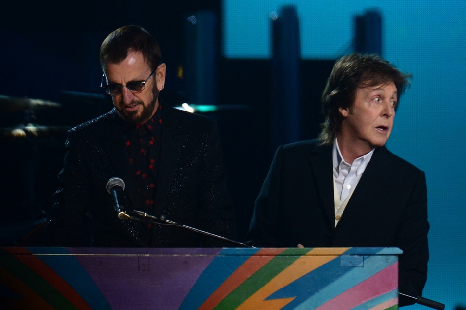 The last two living Beatles members Paul McCartney (r.) and Ringo Star produced a new Fab Four track with a little help from artificial intelligence.