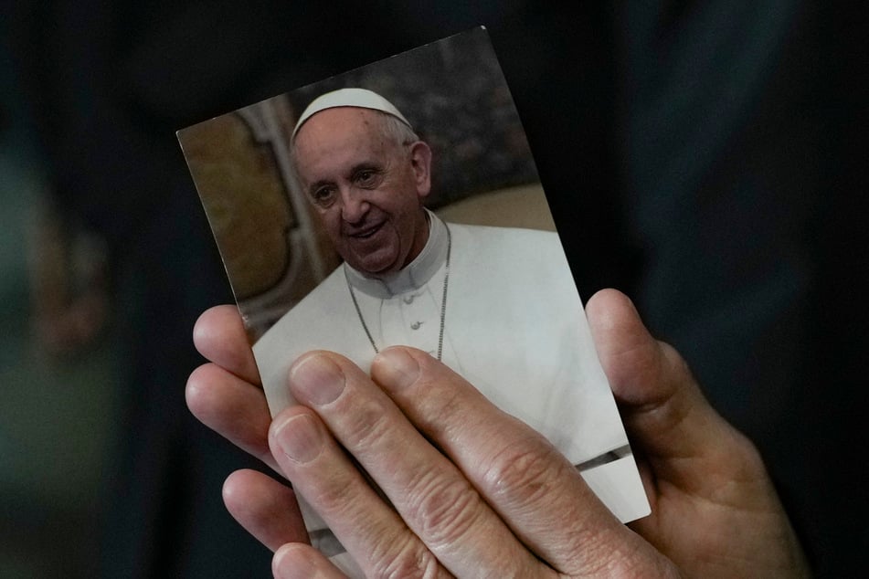 Pope Francis in the photo of a believer.