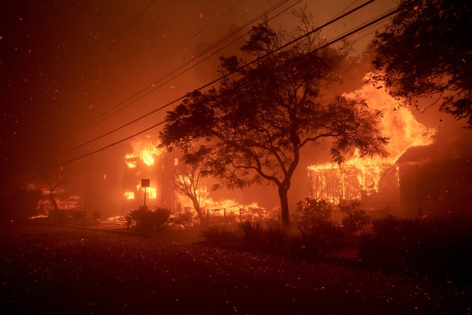 Pacific Palisades go up in flames as huge wildfires spread over Southern California