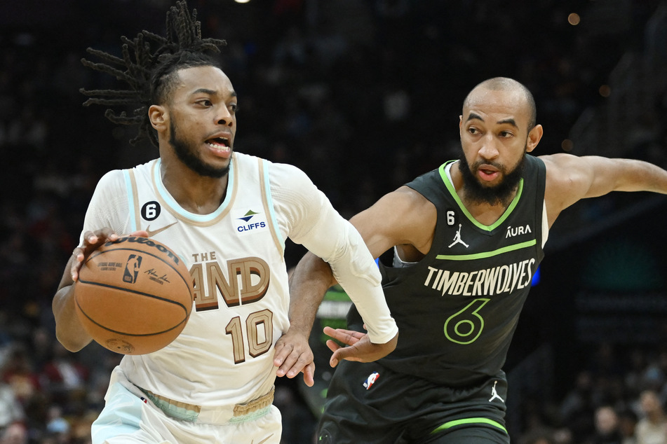 Cleveland Cavaliers guard Darius Garland drives to the basket against Minnesota Timberwolves guard Jordan McLaughlin during the second half at Rocket Mortgage FieldHouse.