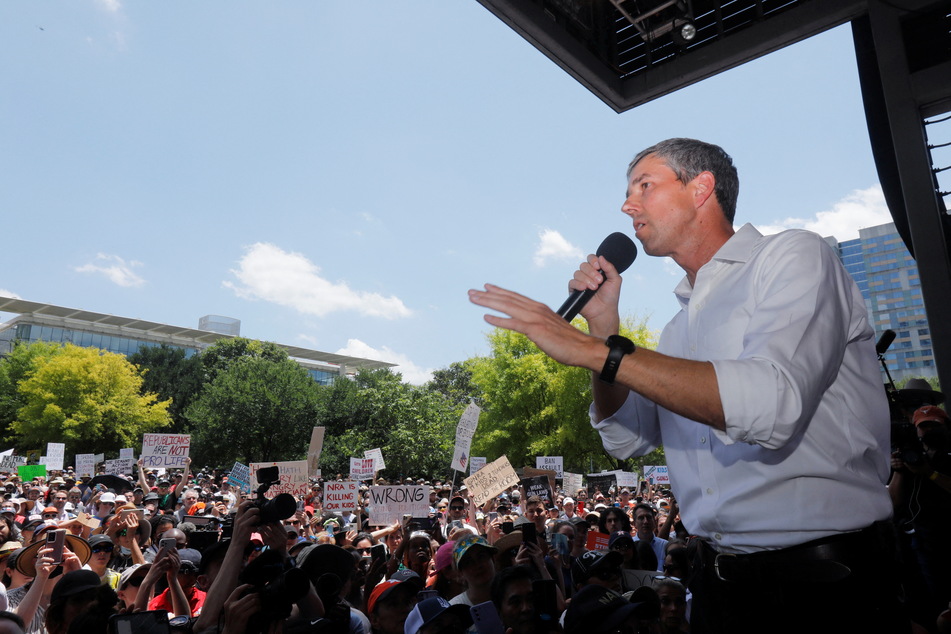 Texas Democratic gubernatorial candidate Beto O'Rourke speaks as people protest against gun laws at Houston's Discovery Green park.