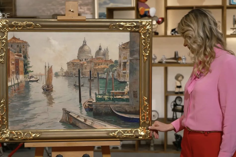Bianca Berding (49) erkennt etliche Mängel auf dem rund 100 Jahre alten Venedig-Kunstwerk von Franz Guillery.