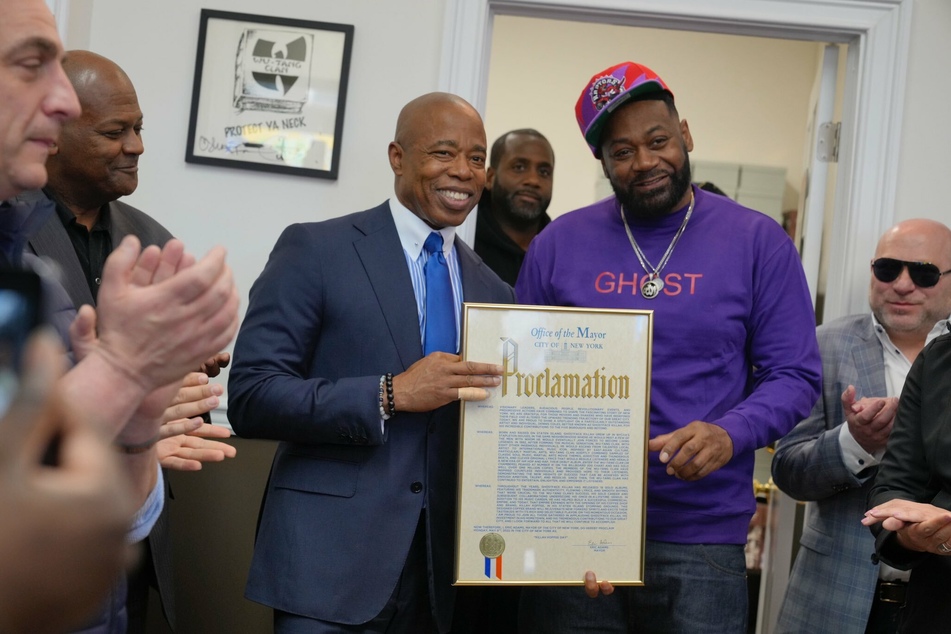 New York City mayor Eric Adams (l.) awarded Ghostface Killah a proclamation in honor of his contributions to music and his new business venture.