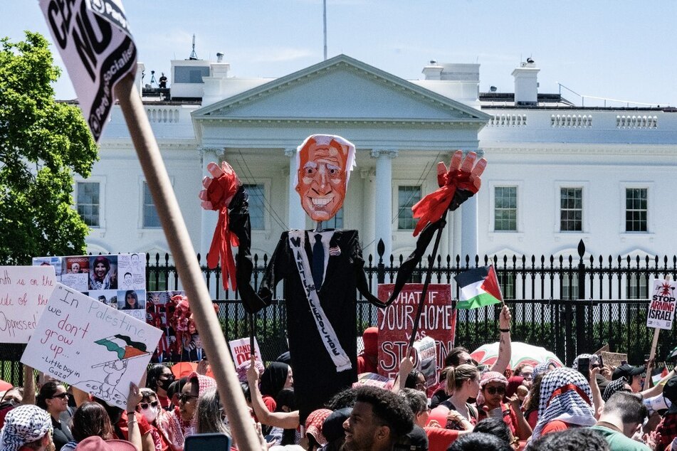 Demonstrators rally outside the White House in Washington DC calling for an end to US support for Israel's massacres in Gaza.