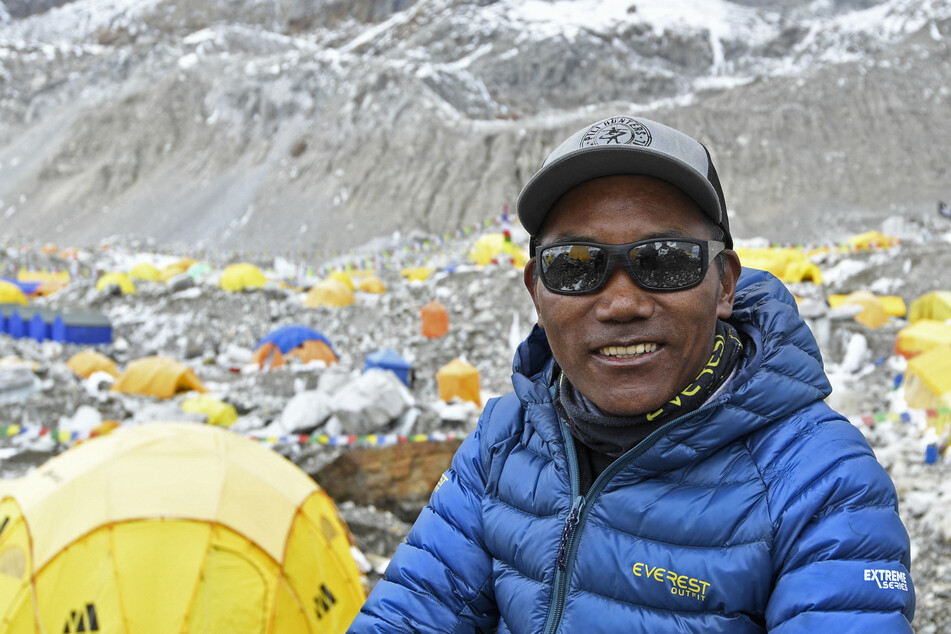 Battle of the Sherpas: Guide sets new Mount Everest record days after being equaled