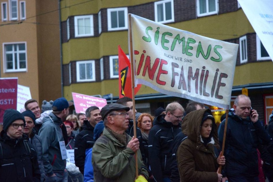 Die Beschäftigten sehen sich als eine Familie - die Konzernspitze sieht das aber anders.