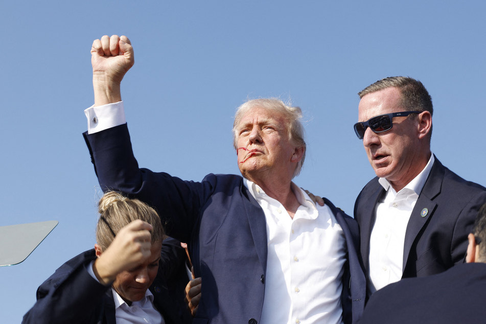 Republican presidential candidate former President Donald Trump is rushed offstage during a rally on Saturday in Butler, Pennsylvania.