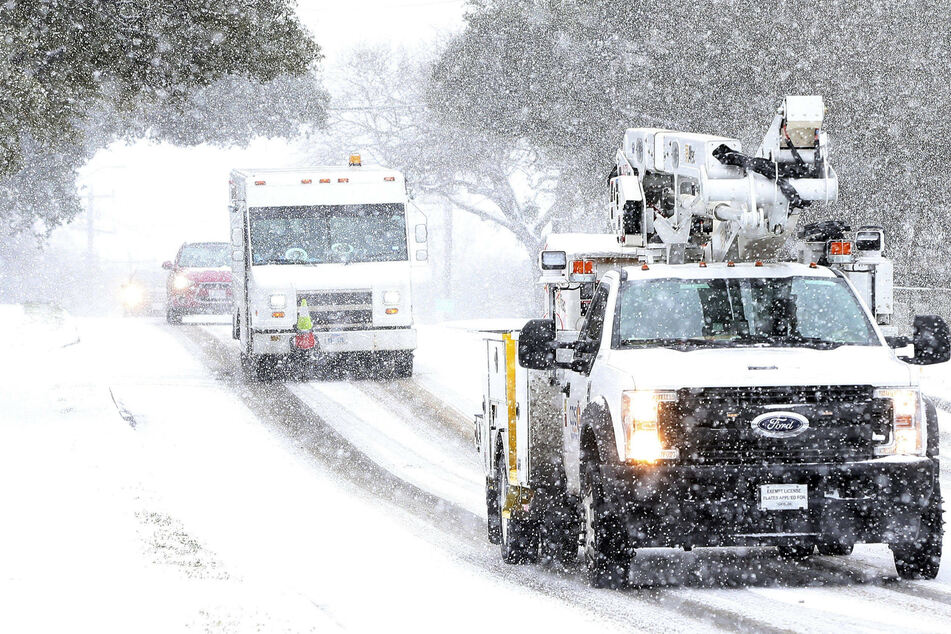 Utility trucks hit the road during February 2021's "snowpocalypse" in Texas as they worked to restore power for residents.