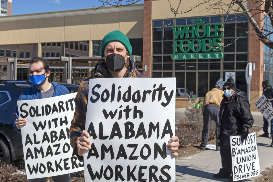 Picketers supporting the Alabama unionization drive marched in front of Amazon Whole Foods market in Detroit. Whole Foods is owned by Amazon.