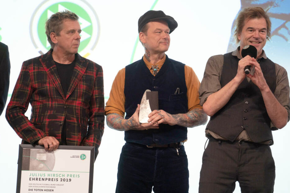 Andreas Meurer, Andreas von Holst und Sänger Campino (v.l.n.r.) von den Toten Hosen.