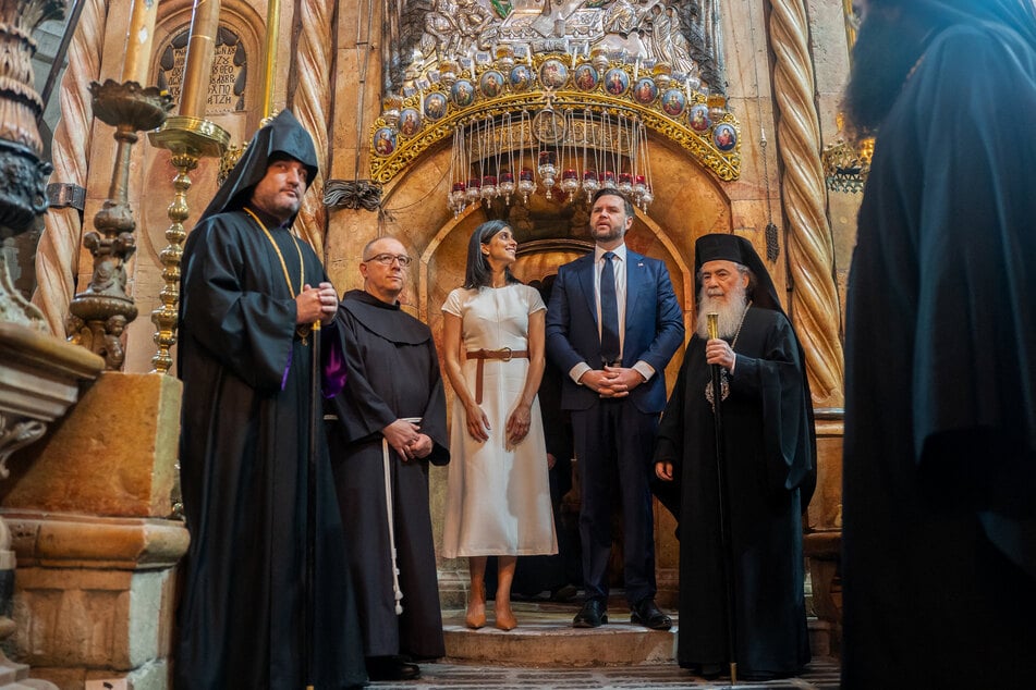 Vice President JD Vance (C-R) and Second Lady Usha Vance (C-L) tour the Church of the Holy Sepulchre in the Old City of Jerusalem on October 23, 2025.