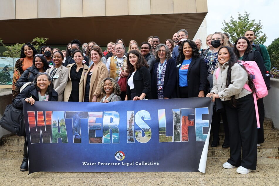 Social and racial justice advocates and Indigenous leaders gather outside the United Nations in Geneva, Switzerland, at the conclusion of the 2023 Human Rights Committee review of the United States.