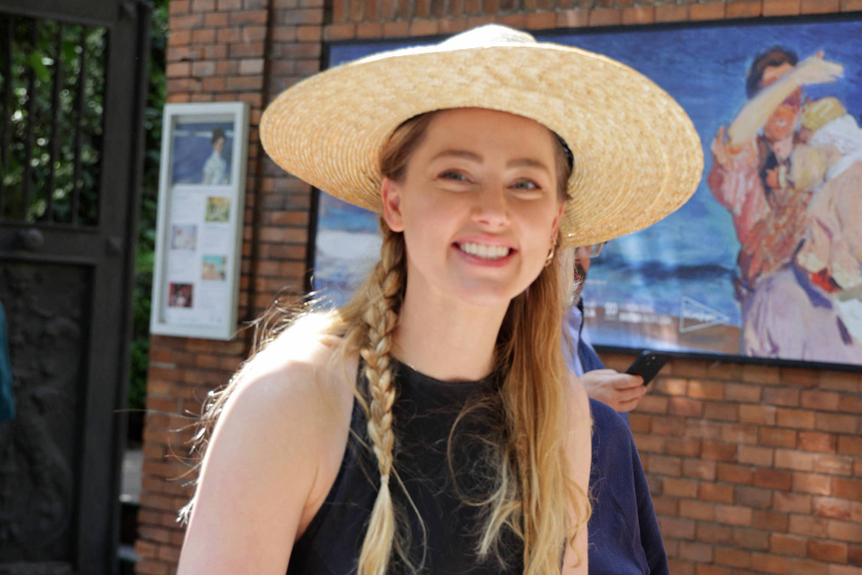 Amber Heard was all smiles at her first red carpet appearance in Italy nearly a year after the explosive defamation trial.