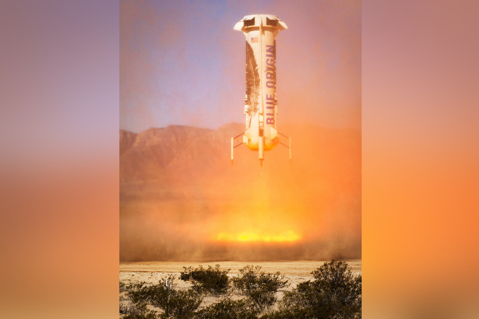 The Blue Origin New Shepard reusable rocket descends to land at the west Texas proving grounds during the third successful launch April 2, 2016 in Van Horn.