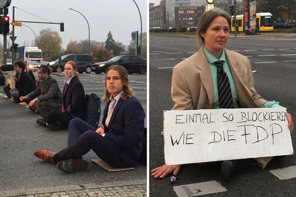 Auch am Mittwoch haben Klimaaktivisten wieder Berliner Straßen blockiert, diesmal als Politiker verkleidet, um gegen die Blockadehaltung der FDP zu protestieren.