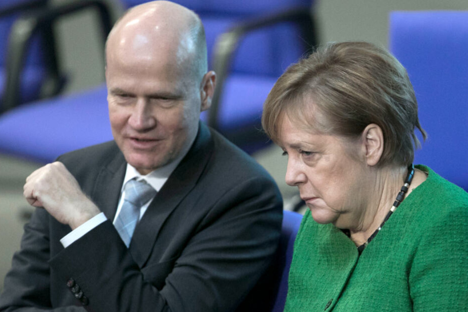 Der neue Mann an Angela Merkels (rechts) Seite im Bundestag: Ralph Brinkhaus (links).
