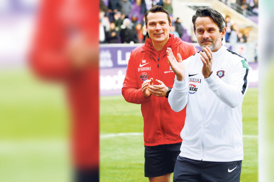 Hoffentlich können Chefcoach Dirk Schuster (r.) und Assistenztrainer Marc Hensel ihrer Mannschaft auch am Samstag nach dem Spiel beim VfB Stuttgart Beifall spenden ...