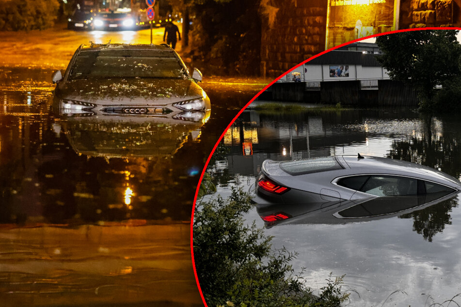 Land unter: Hochwasser schluckt Autos, Menschen müssen von Dach gerettet werden