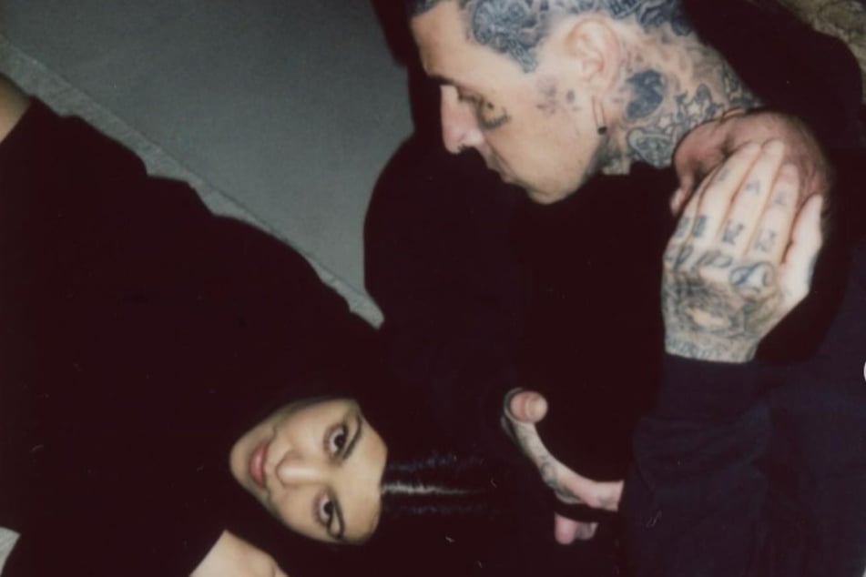 Kourtney Kardashian shared how she and Travis Barker (r.) commemorated their "sex-versary" while preparing for baby Rocky.