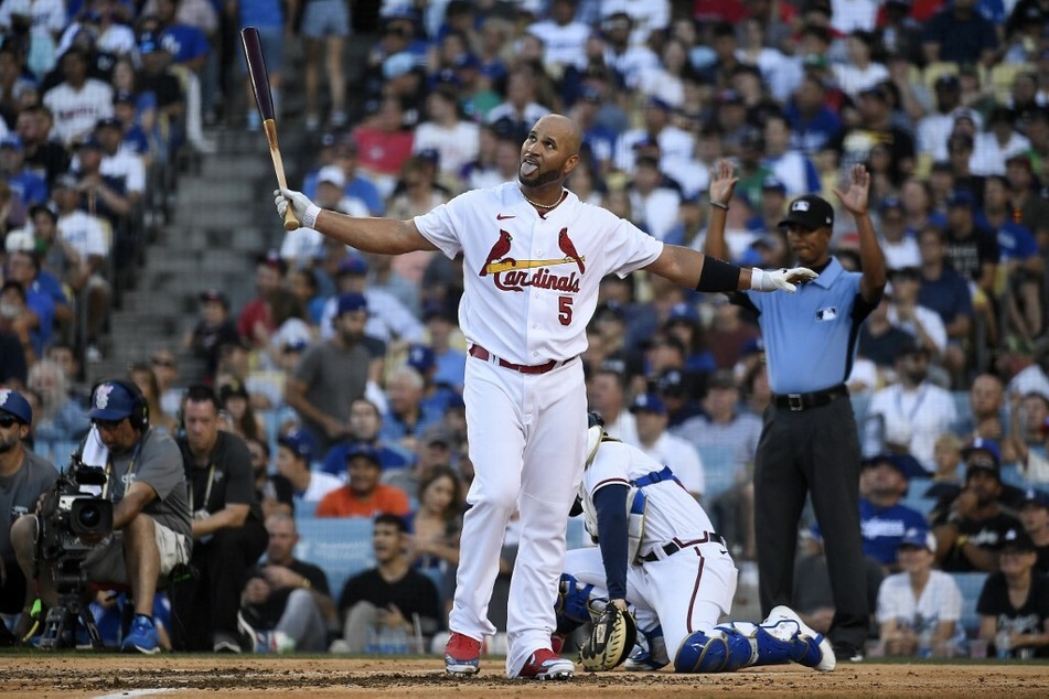 National League All-Star Albert Pujols of the St. Louis Cardinals reacts while competing during the 2022 T-Mobile Home Run Derby at Dodger Stadium.