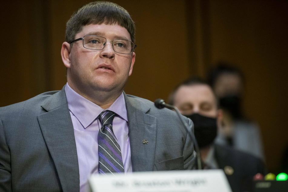 Braxton Wright testifies before the Senate Budget Committee in a hearing on Wall Street greed.