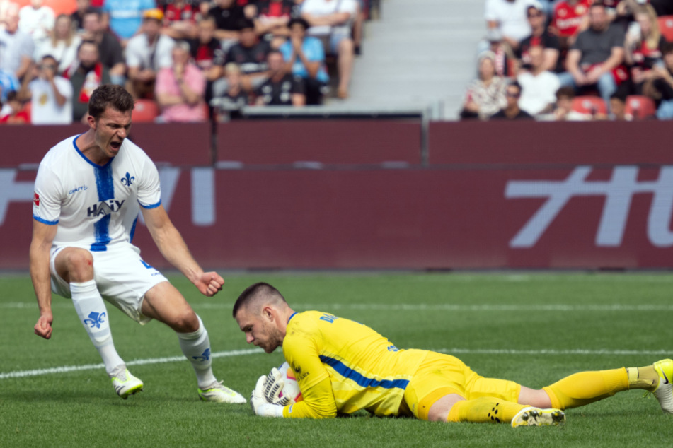 Lilien-Innenverteidiger Christoph Zimmermann (31, l.) glaubt auch nach dem bitteren Bundesliga-Abstieg fest an eine erfolgreiche Zukunft des SV Darmstadt 98.