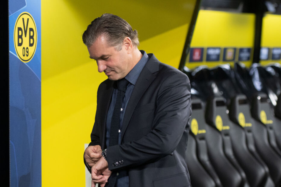 Was sagt die Uhr? Die Zeit von Sancho beim BVB könnte bald um sein, das weiß auch BVB-Sportdirektor Michael Zorc.