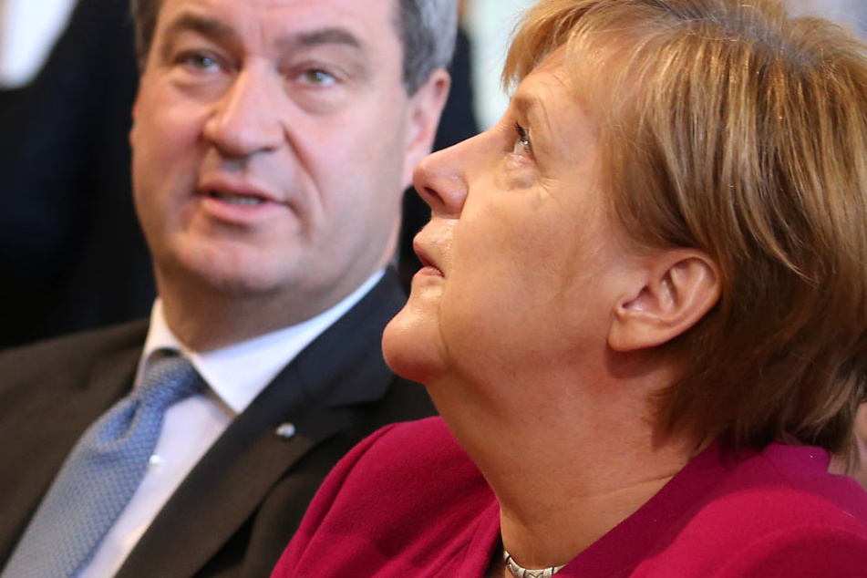 Markus Söder (l.) will den Streit von 2018 hinter sich und den anderen Parteien lassen. (Archivbild)