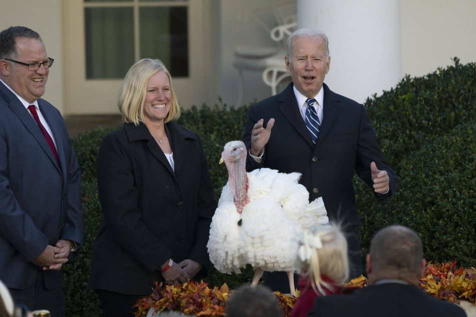 Joe Biden pardoning Peanut Butter at the White House.
