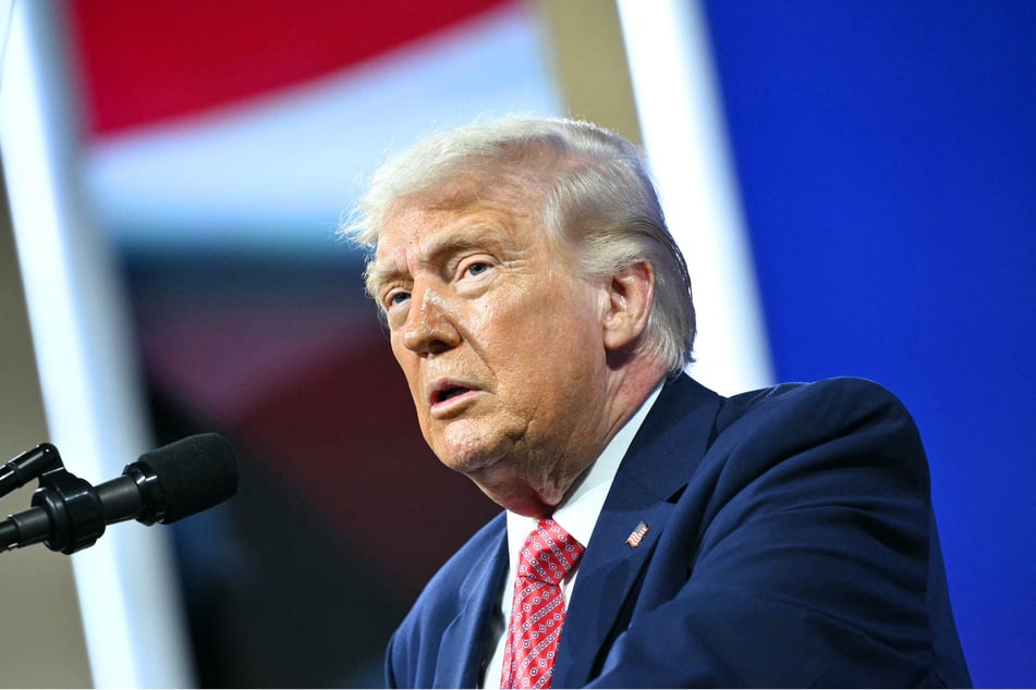 A Massachusetts man was indicted on Wednesday for allegedly sharing social media posts in which he threatened to kill President Donald Trump.